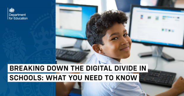 A young boy with curly hair sits at a computer in a classroom, smiling at the camera. The background shows multiple computer monitors with blurred content. On the left side of the image, there is a blue banner with the Department for Education logo. Bold white and black text overlaid on the image reads: "BREAKING DOWN THE DIGITAL DIVIDE IN SCHOOLS: WHAT YOU NEED TO KNOW."